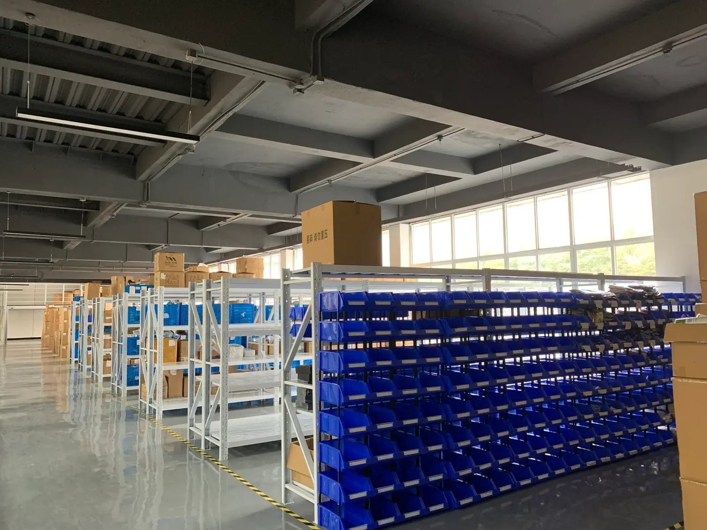 E-commerce fulfilment warehouse with inspection bins